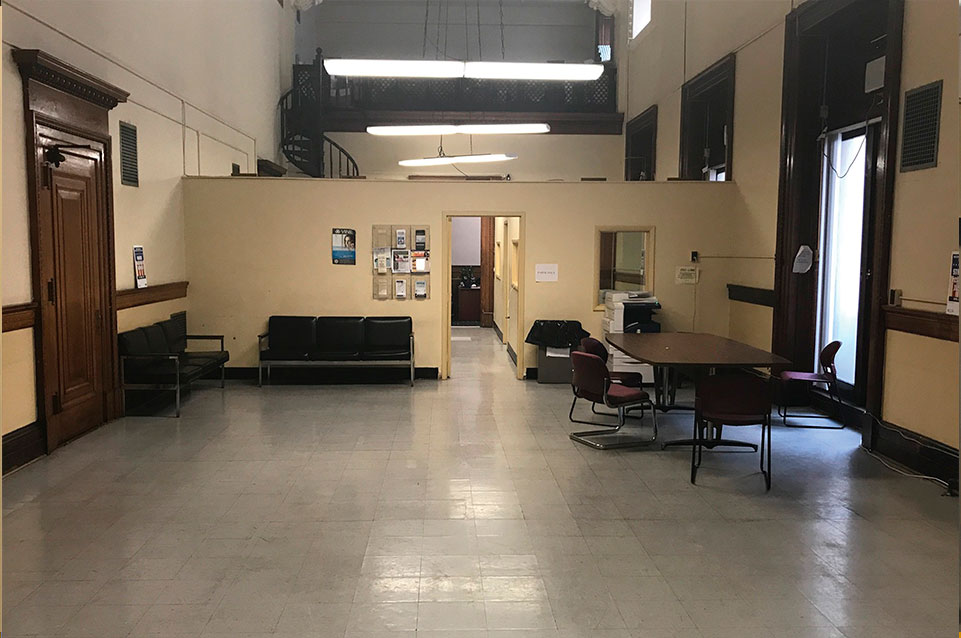 Image of the Victim and Witness Waiting Room entrance area before renovation.