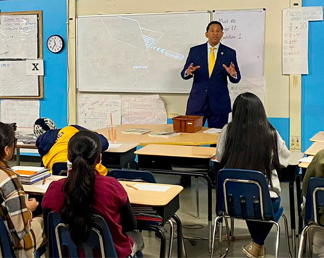 The State's Attorney speaking at a school